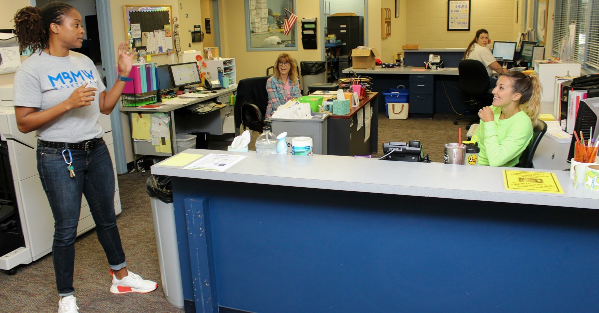 Administrative staff members are the first to reunite at school after the summer break.