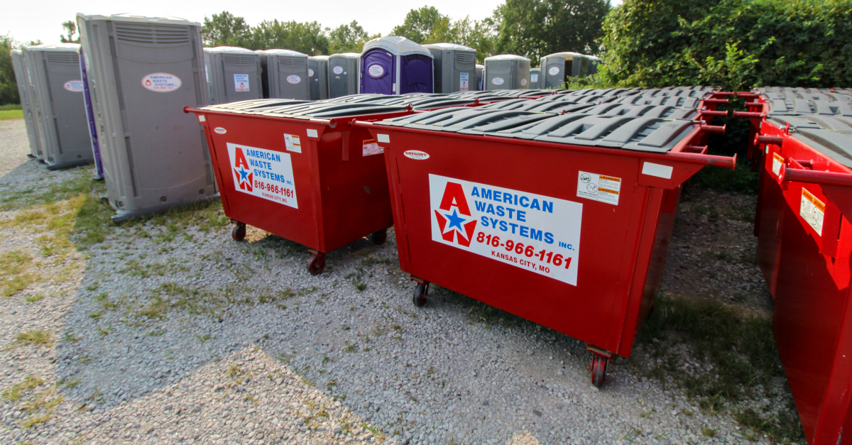 Portable toilets and roll off dumpsters stored on site.