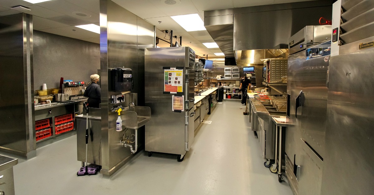A commercial kitchen strategically designed for dine-in and take-out at Jack Stack Martin City.