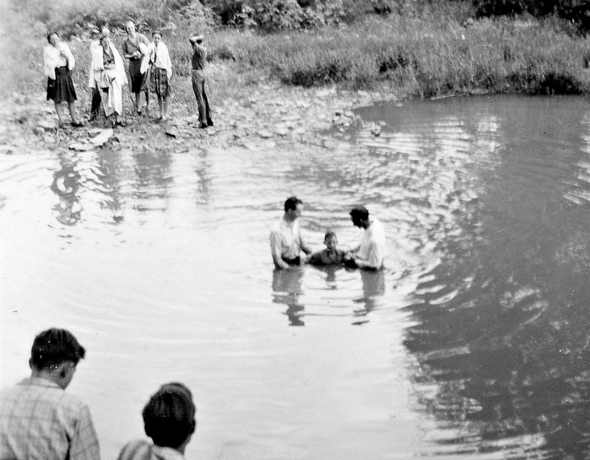 Baptisms like this one after the summer revival of 1946 were not uncommon in the Blue River.